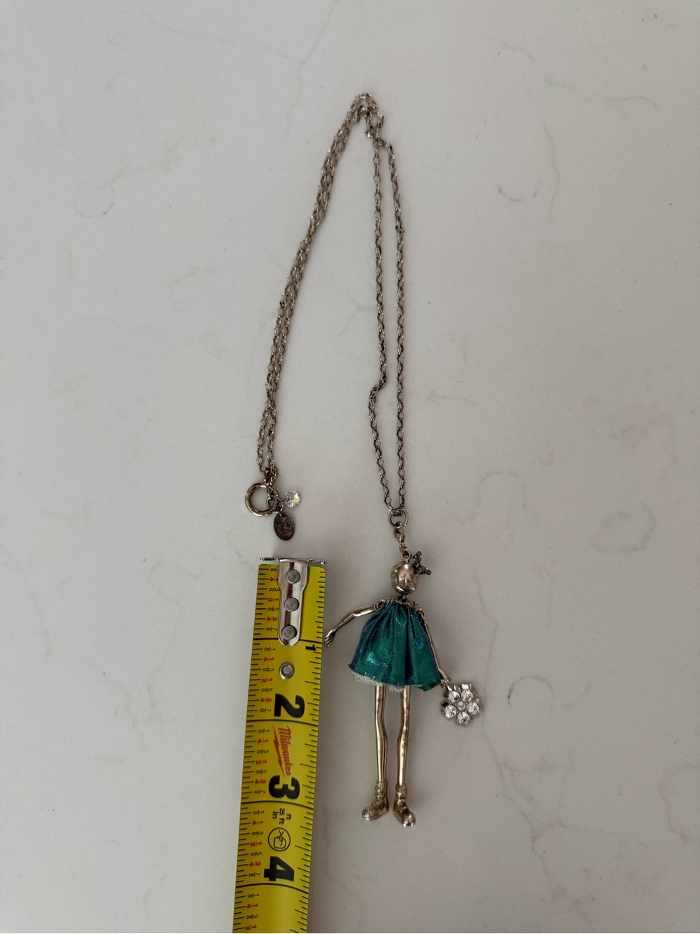 Servane Gaxotte silver doll necklace